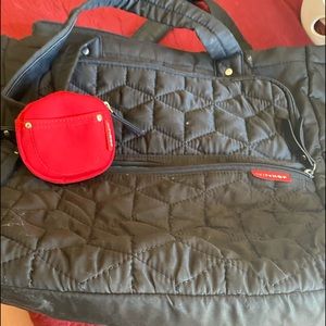 Skip hop black baby bag with bonus pacifier case